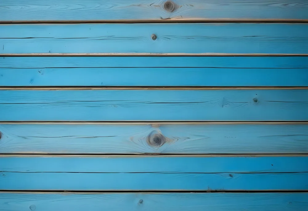 Blue Painted Wooden Planks With Visible Wood Grain And Knots Arranged Horizontally Creating A Rustic And Textured Surface 42 9c43