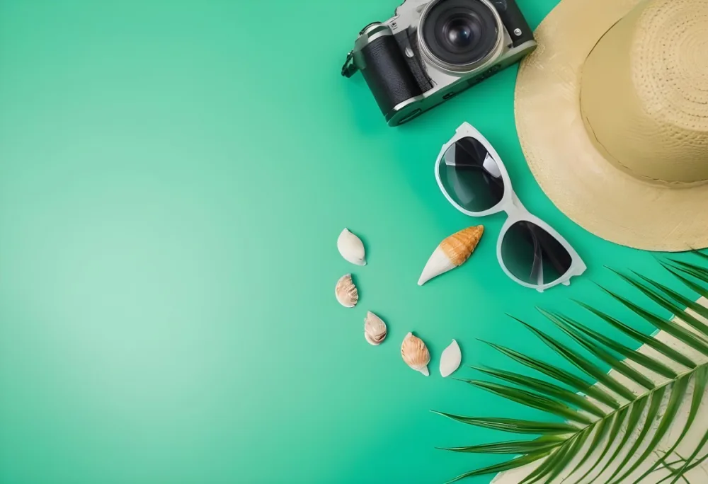 Camera Sunglasses Shells Straw Hat And A Palm Leaf On A Green Background Summer Vacation Concept Travel And Tourism 27 1f28