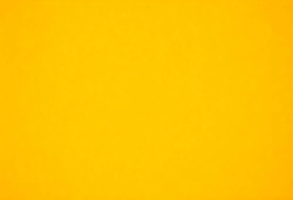 Close Up Of A Yellow Wall With A Rough Texture The Wall Is Made Of Concrete And Has A Lot Of Small Bumps 1 86e3