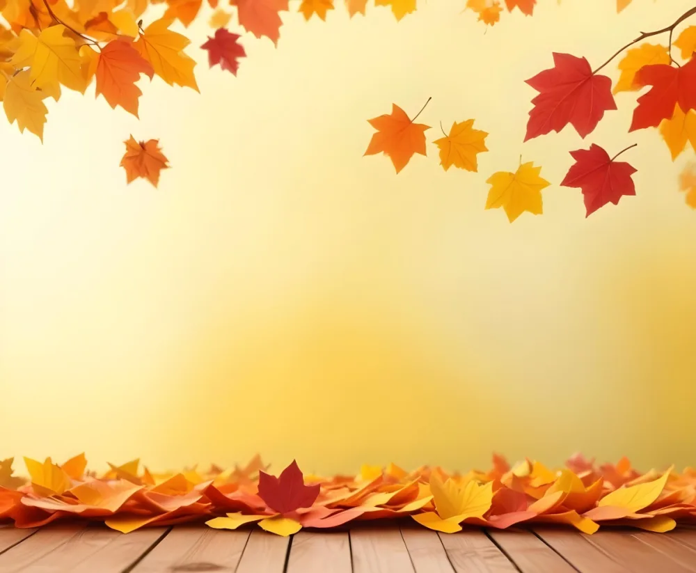 Colorful Autumn Leaves Falling On A Blurred Yellow And Orange Background With A Wooden Surface In The Foreground 3 B9b7