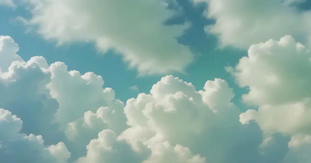 Fluffy White Clouds In A Blue Sky With A Soft Hazy Atmosphere 22 F5ed