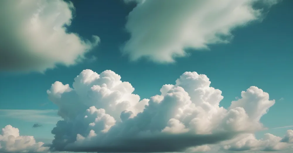 Fluffy White Clouds In A Blue Sky With A Soft Hazy Atmosphere 5 Fbe6