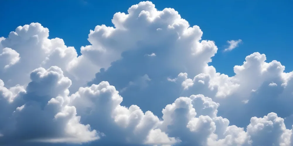 Fluffy White Clouds In A Bright Blue Sky 15 40ad