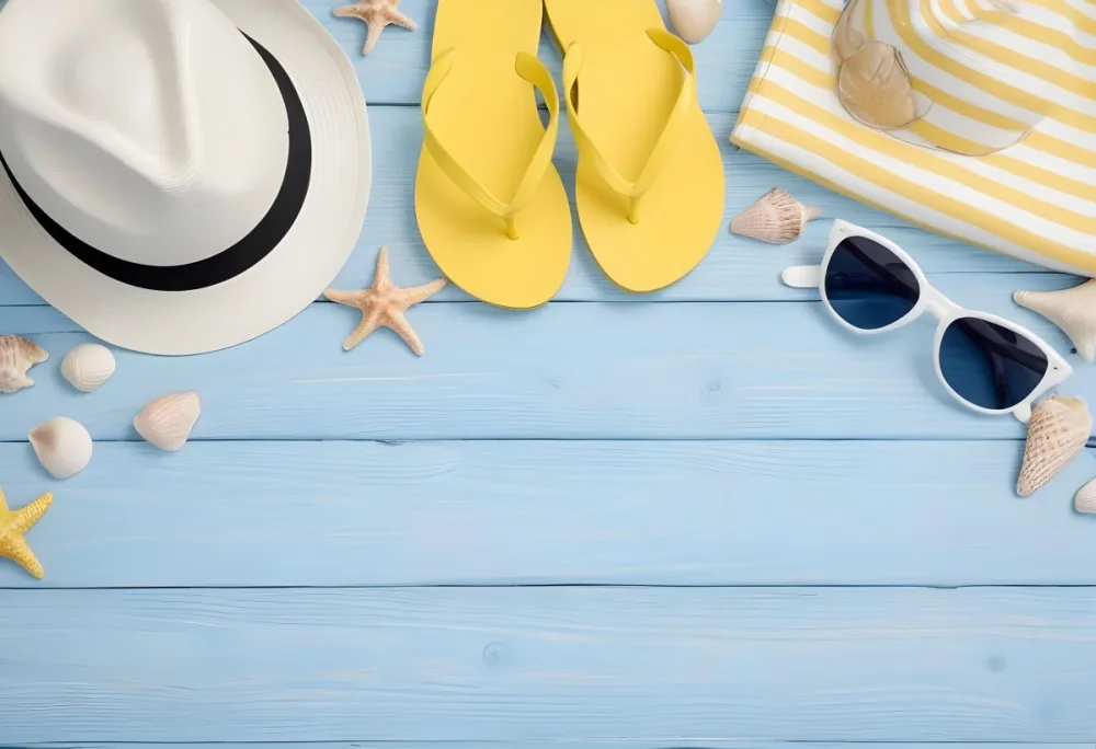 Overhead Shot Of A White Hat Yellow Flip Flops Sunglasses Seashells And Starfish On A Blue Wooden Surface 18 E39d