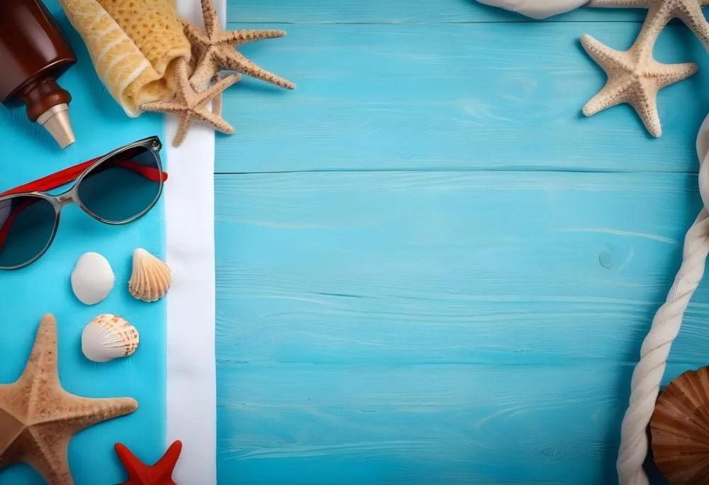 Seashells Starfish Sunglasses And Towel On A Blue Wooden Surface Summer Vacation Concept Beach Background 7 7016