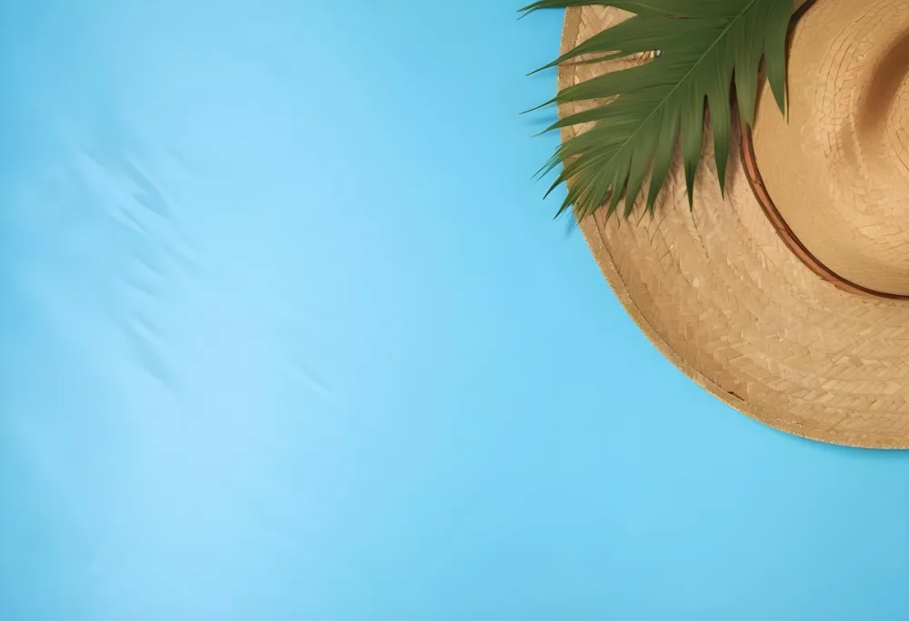 Straw Hat With A Green Palm Leaf On A Blue Wooden Table Summer Vacation Concept Tropical Vibes Vibrant Colors Top Down Perspective Bright Sunlight 15 2ba3