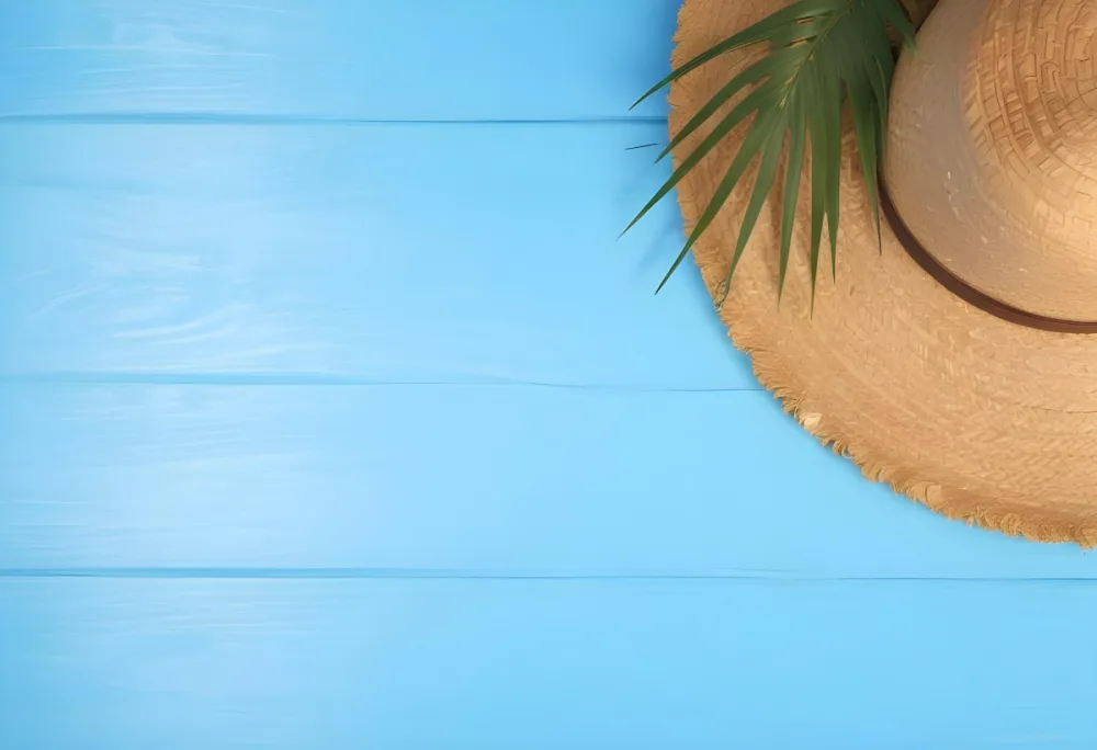 Straw Hat With A Green Palm Leaf On A Blue Wooden Table Summer Vacation Concept Tropical Vibes Vibrant Colors Top Down Perspective Bright Sunlight 16 F8c4
