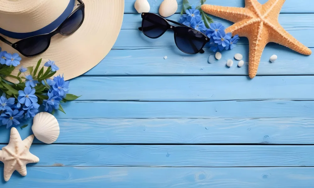 Sunglasses Seashells Starfish Hat And Blue Flowers On A Blue Wooden Table Summer Vacation Concept Tropical Background 14 Ea66