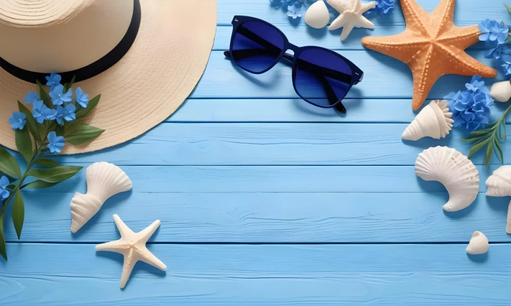 Sunglasses Seashells Starfish Hat And Blue Flowers On A Blue Wooden Table Summer Vacation Concept Tropical Background 17 C8a8