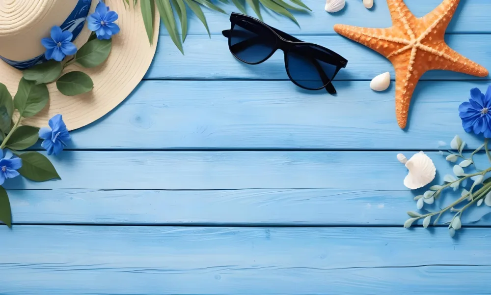Sunglasses Seashells Starfish Hat And Blue Flowers On A Blue Wooden Table Summer Vacation Concept Tropical Background 18 A09e