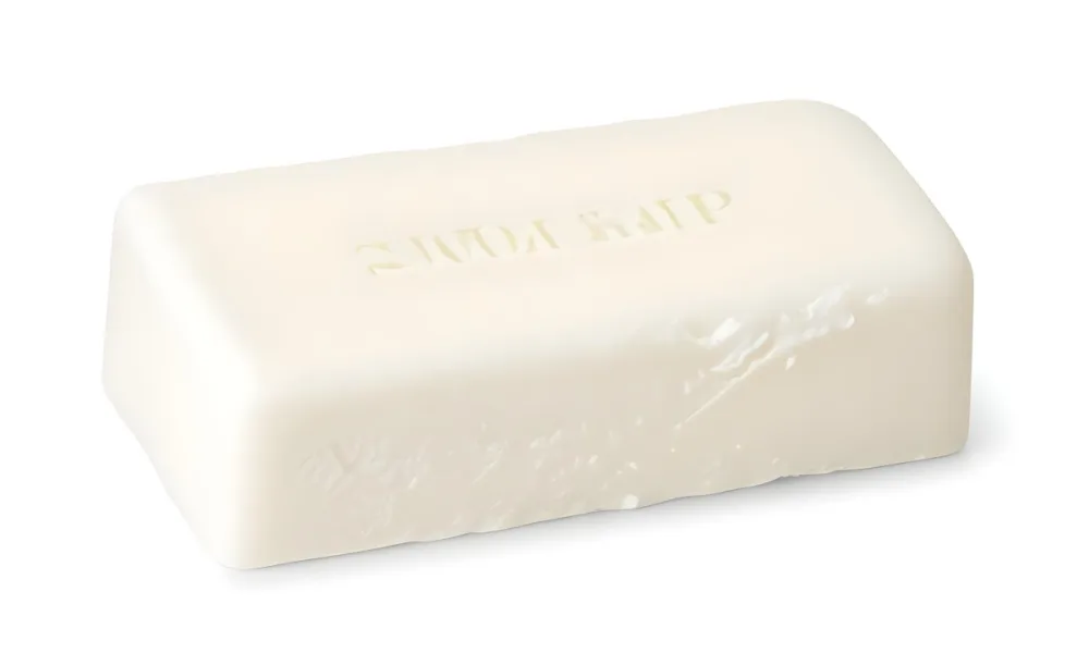 A Bar Of White Soap With A Slightly Rough Texture Casting A Soft Shadow On A Plain White Background 13 9b85