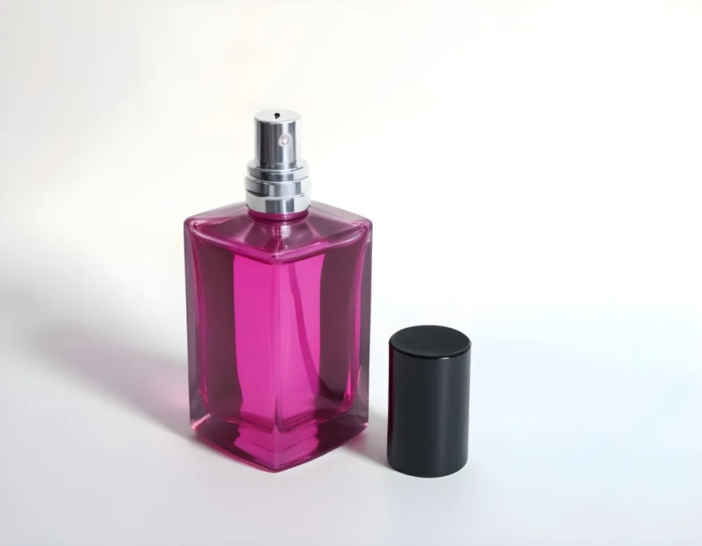 A Black Perfume Bottle With A Pink Sprayer And A Pink Cap On A White Surface Product Photography Studio Lighting Clean Background 7 4381