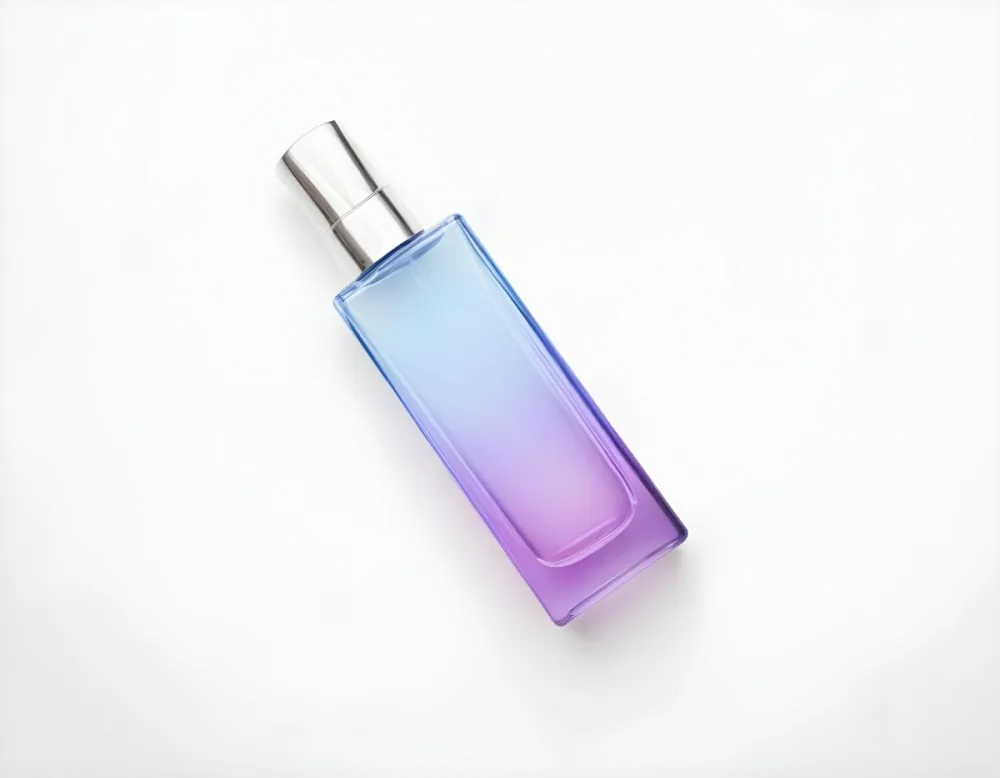 A Blue And Purple Gradient Perfume Bottle With A Silver Cap On A White Background 20 4740