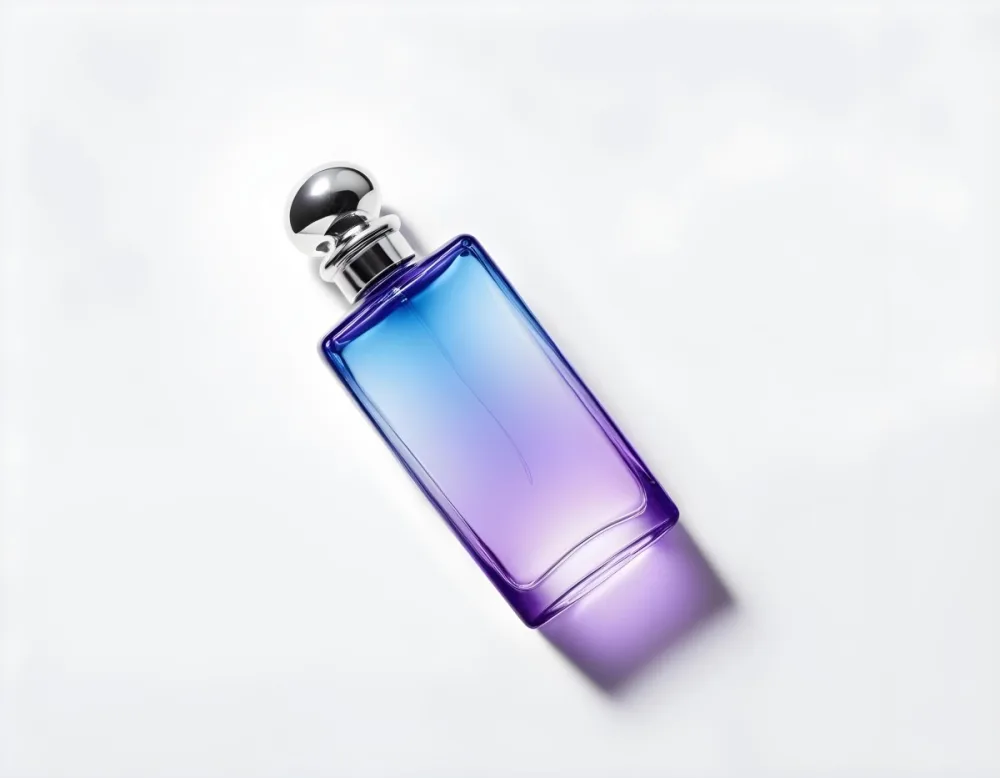 A Blue And Purple Gradient Perfume Bottle With A Silver Cap On A White Background 5 3e72