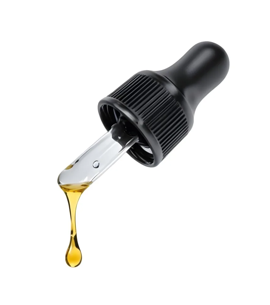 A Close Up Of A Black And Transparent Glass Dropper With A Golden Liquid Drop Falling Isolated On A Black Background Showcasing The Texture And Color 1 067b