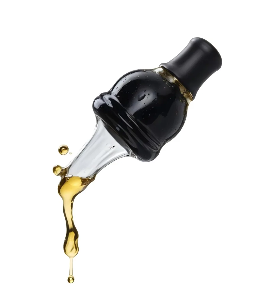 A Close Up Of A Black And Transparent Glass Dropper With A Golden Liquid Drop Falling Isolated On A Black Background Showcasing The Texture And Color 23 D925