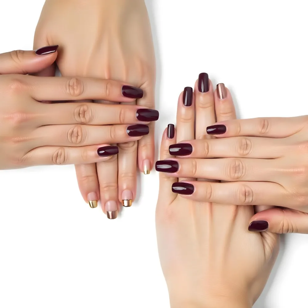 A Close Up Of A Woman S Hands With Dark Red Nail Polish 21 6446