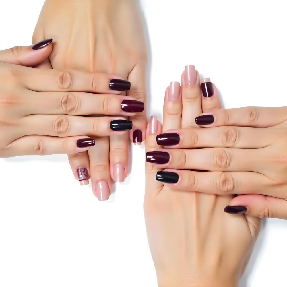 A Close Up Of A Woman S Hands With Dark Red Nail Polish 26 95ae