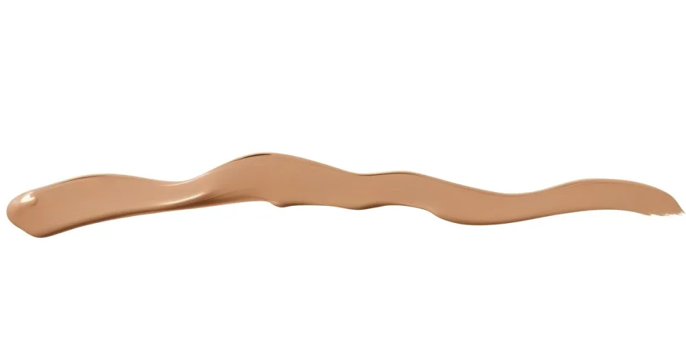A Line Of Light Brown Liquid Foundation Isolated On A White Background With A Smooth And Slightly Glossy Texture Used For Cosmetics 2 4339