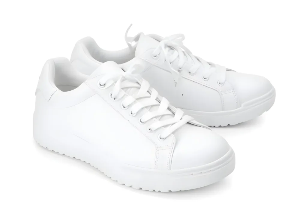 A Pair Of White Sneakers With White Laces White Sole White Background 18 5d60
