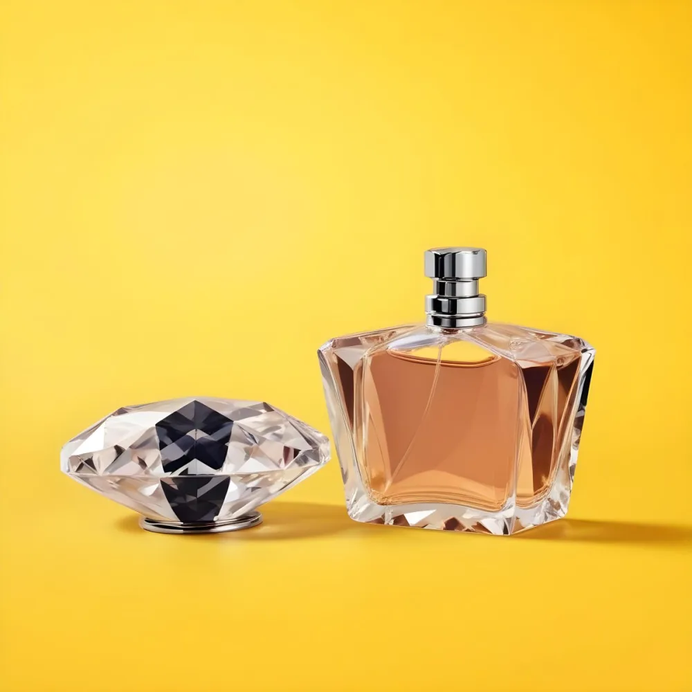A Perfume Bottle With A Diamond Shaped Cap Next To It On A Yellow Background 28 9e91