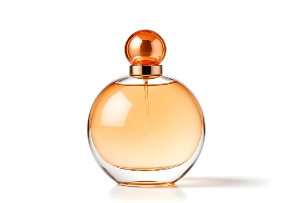 A Perfume Bottle With A Round Body And A Spherical Cap Filled With A Light Orange Liquid On A White Background 15 7fd8