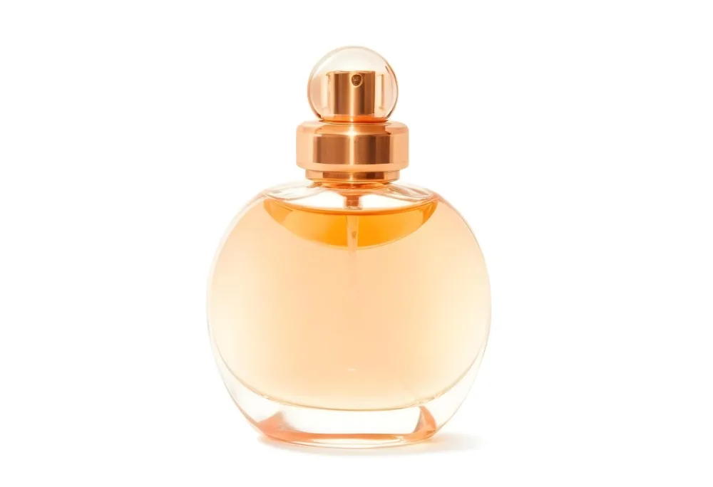 A Perfume Bottle With A Round Body And A Spherical Cap Filled With A Light Orange Liquid On A White Background 20 Ef96