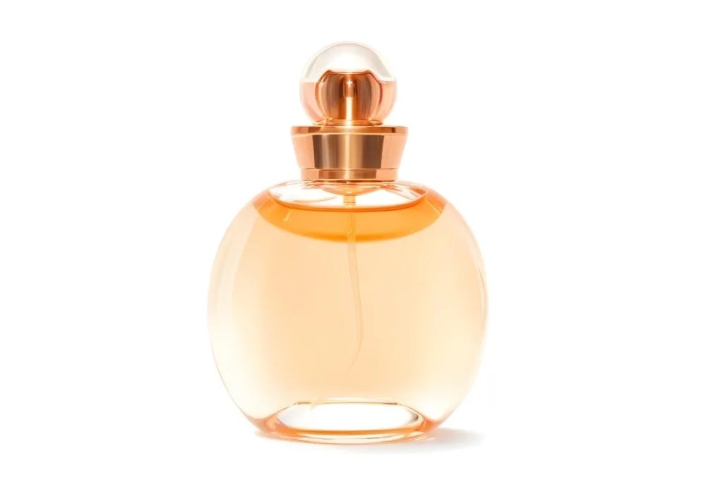 A Perfume Bottle With A Round Body And A Spherical Cap Filled With A Light Orange Liquid On A White Background 37 356b