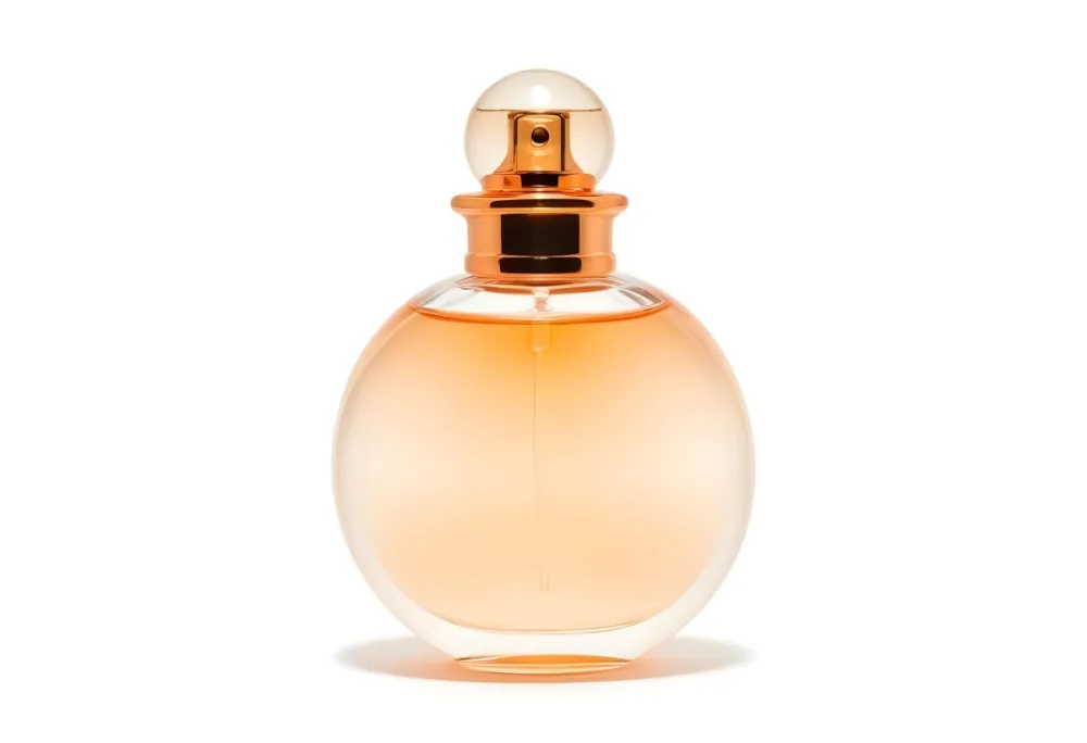 A Perfume Bottle With A Round Body And A Spherical Cap Filled With A Light Orange Liquid On A White Background 42 Ff93