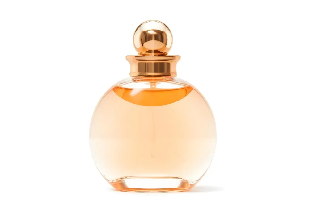 A Perfume Bottle With A Round Body And A Spherical Cap Filled With A Light Orange Liquid On A White Background 43 3dc7