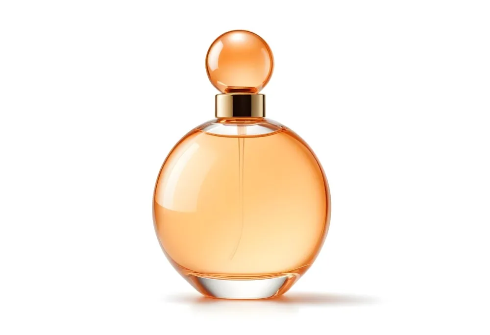 A Perfume Bottle With A Round Body And A Spherical Cap Filled With A Light Orange Liquid On A White Background 7 Bd79