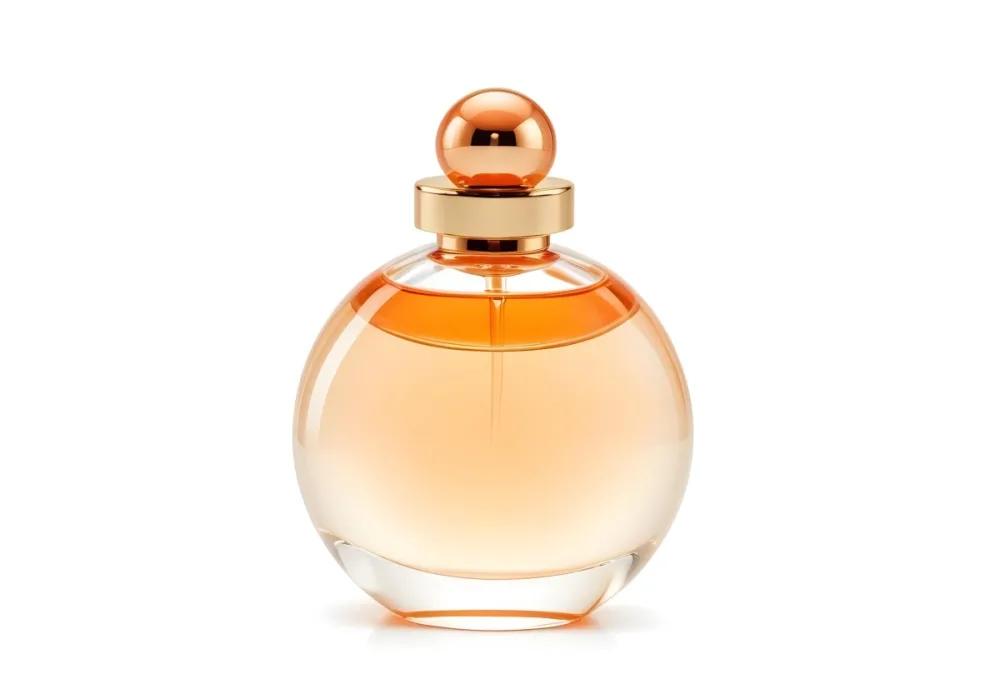 A Perfume Bottle With A Round Body And A Spherical Cap Filled With A Light Orange Liquid On A White Background 9 Cd64