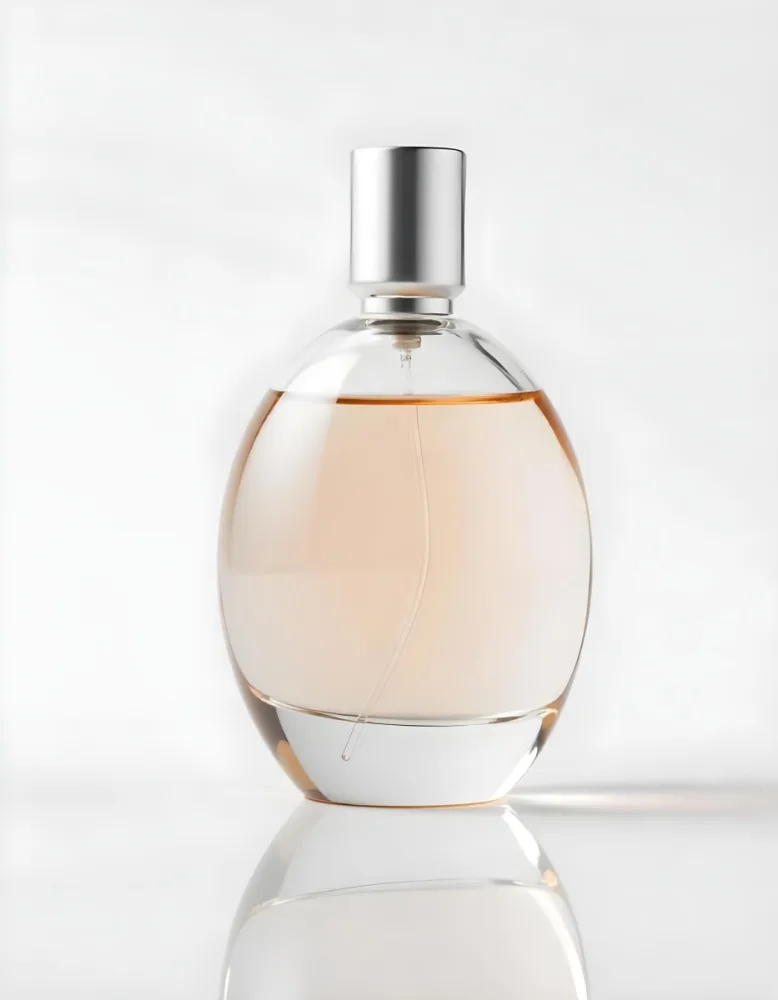 A Pink Colored Perfume Bottle With A Silver Cap 18 D1c4