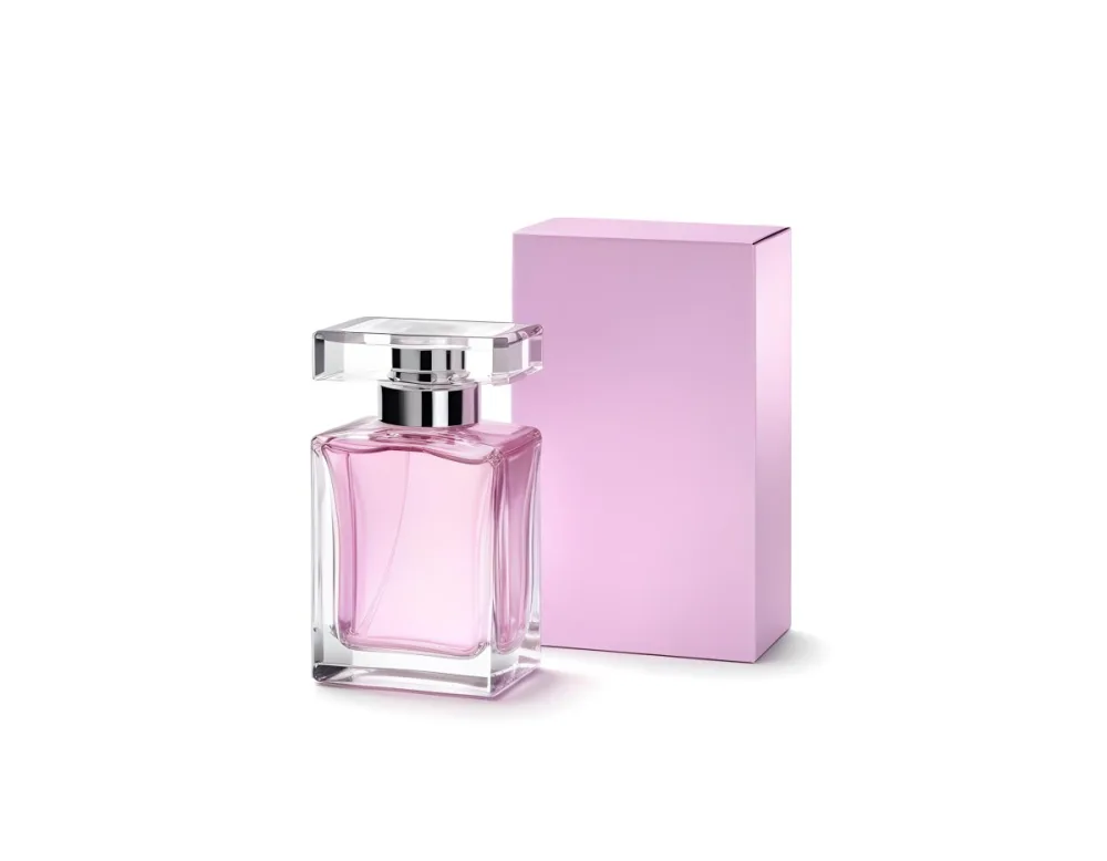 A Square Glass Perfume Bottle With A Pink Cap And A White Box Behind It On A White Background 15 A8f9