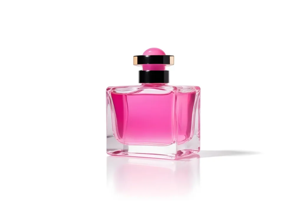 A Square Glass Perfume Bottle With A Pink Cap Filled With Bright Pink Liquid On A Black Background 35 Bc9d