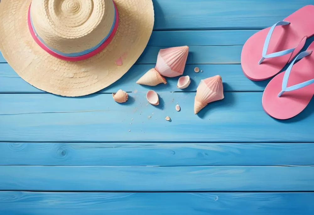A Straw Hat Blue And Pink Flip Flops And Seashells Scattered On A Blue Wooden Surface Evoking A Beach Vacation Atmosphere 4 A388