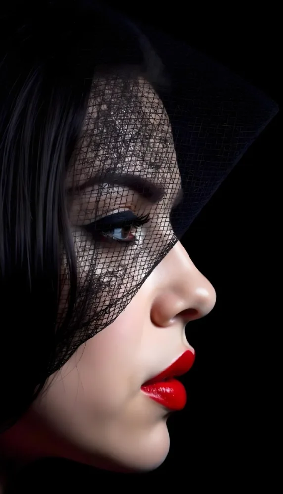 A White Woman Age 30 With Black Lips And Black Veil In A Black Background 5 60f7