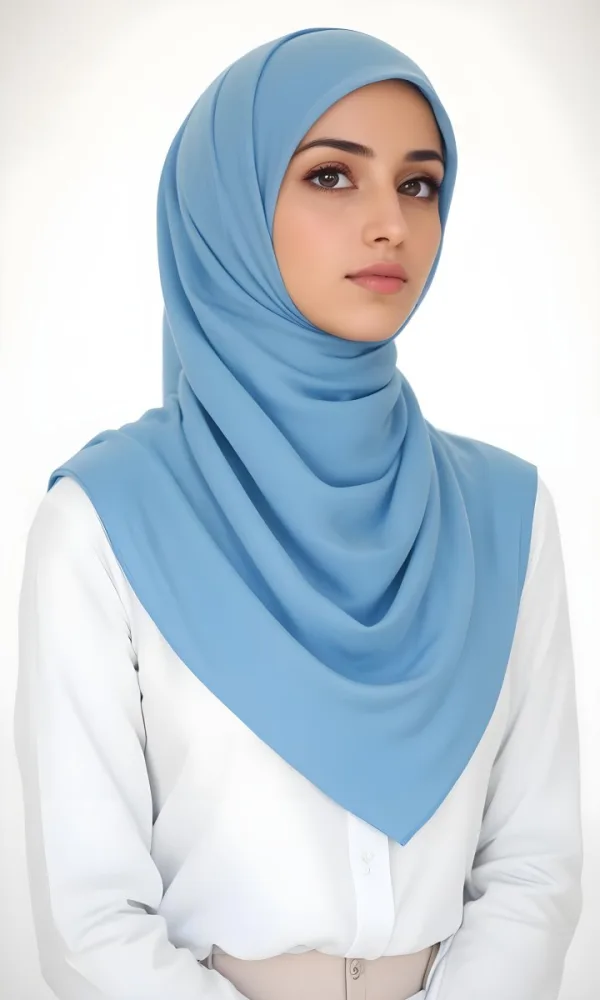 A Young Middle Eastern Woman Wearing A Light Blue Hijab Looking Directly At The Camera With A Serious Expression 19 B4df