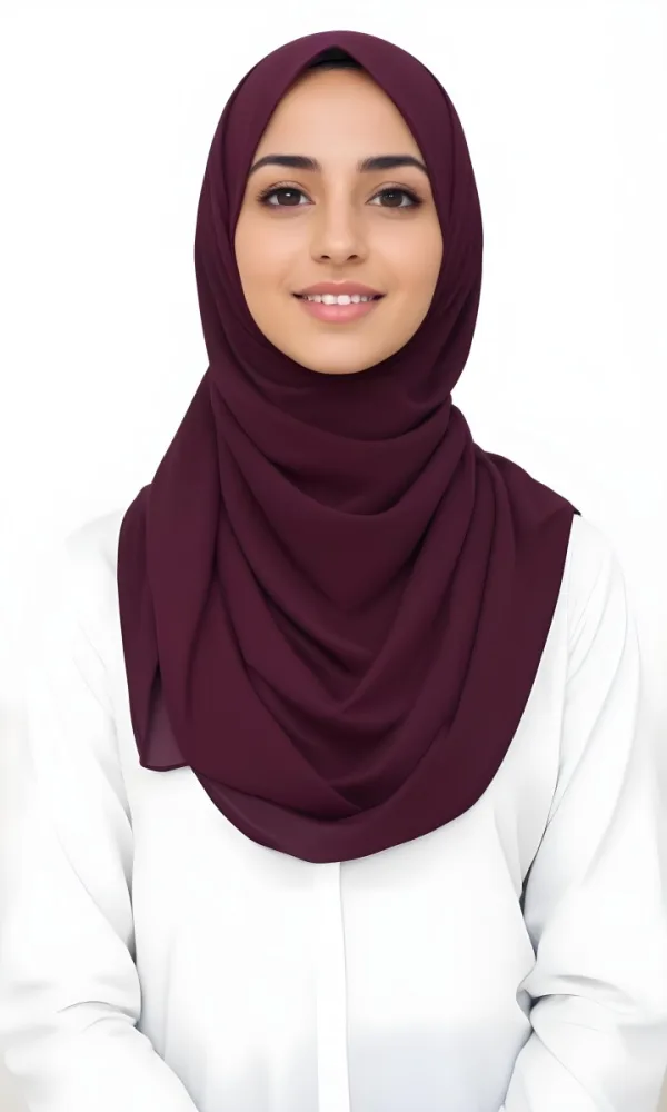 A Young Middle Eastern Woman With Dark Hair Wearing A Burgundy Hijab Smiling At The Camera 20 E972