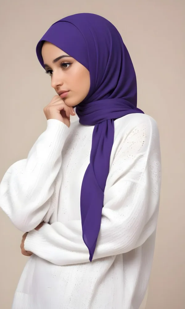 A Young Middle Eastern Woman With Dark Hair Wearing A Purple Hijab Looking Directly At The Camera With A Serious Expression 10 7ce0