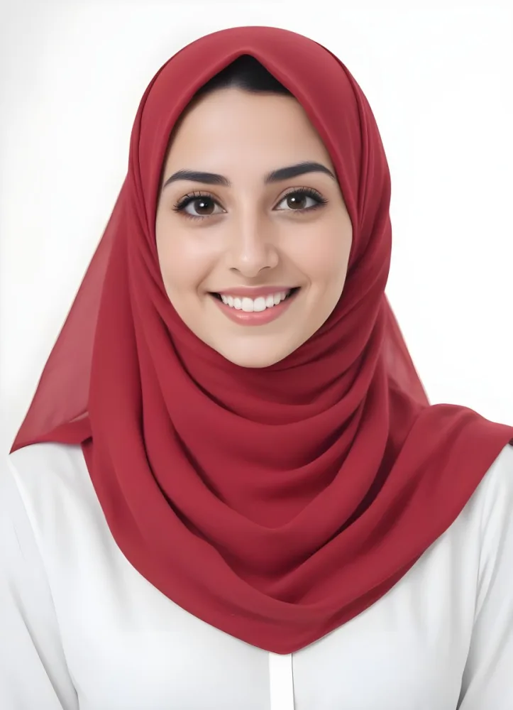 A Young Middle Eastern Woman With Dark Hair Wearing A Red Hijab Smiling At The Camera 14 Abc9