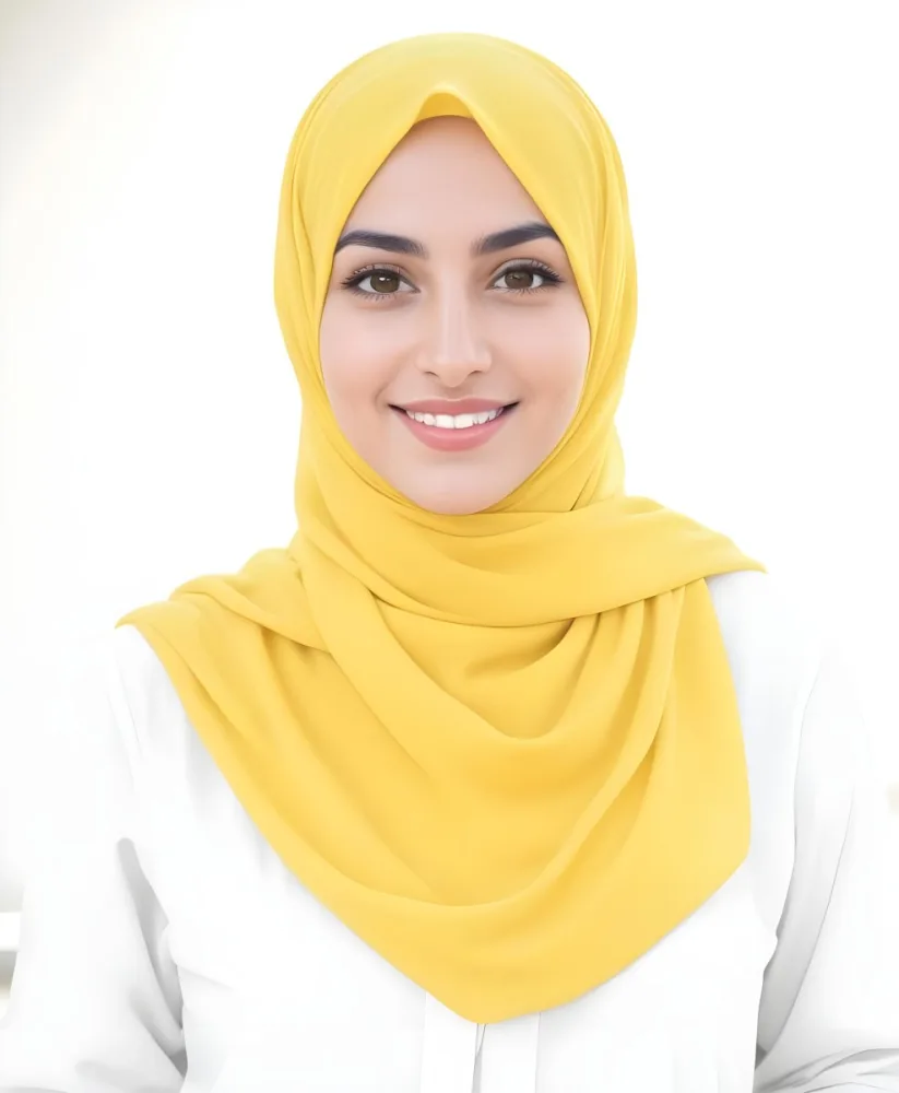 A Young Middle Eastern Woman With Dark Hair Wearing A Yellow Hijab And Smiling At The Camera 13 7af0