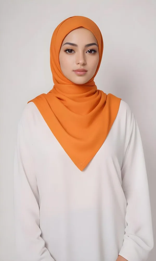 A Young Southeast Asian Woman With Long Dark Hair Wearing An Orange Hijab And A White Top 18 128f