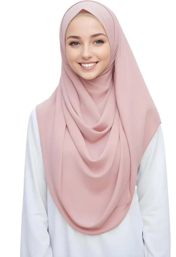 A Young Woman With Light Brown Skin Wearing A Pink Hijab And Smiling At The Camera 15 1b5a