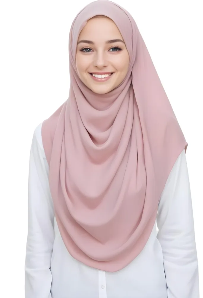 A Young Woman With Light Brown Skin Wearing A Pink Hijab And Smiling At The Camera 21 1e1a