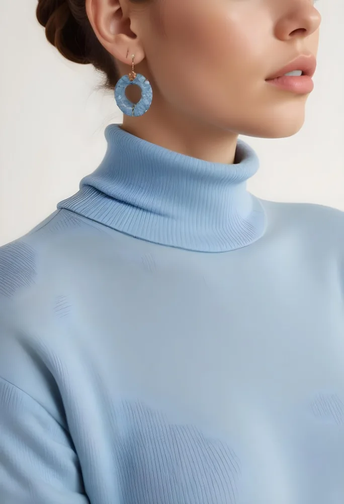 A Young Woman With Long Light Hair Wearing A Light Blue Turtleneck Sweater And Large Round Earrings 7 76d2