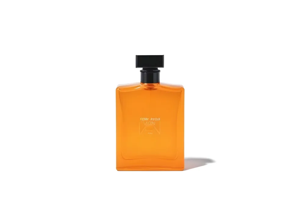 An Orange Perfume Bottle With White Cap And The Words For Men In A Black Background 3 5dec