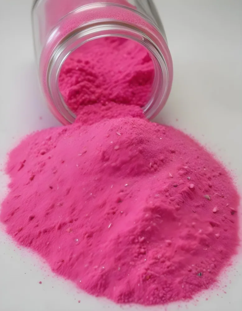 Bright Pink Glittery Sand Spilling Out Of A Clear Glass Jar With A Mound Of Sand On A White Surface 16 D54a