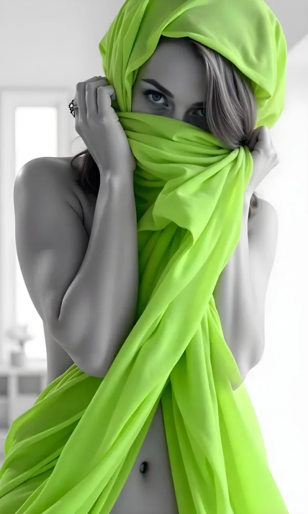 Caucasian Woman Age 25 With Brown Hair Partially Covered By A Vibrant Green Fabric In A Minimalist Gray And White Indoor Setting 32 C053