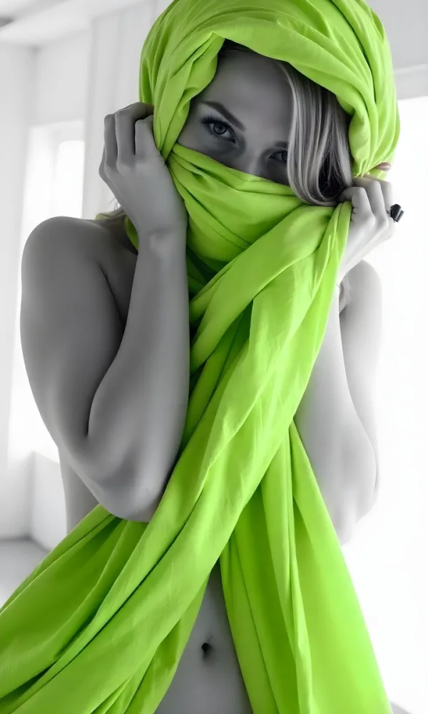 Caucasian Woman Age 25 With Brown Hair Partially Covered By A Vibrant Green Fabric In A Minimalist Gray And White Indoor Setting 5 78d8